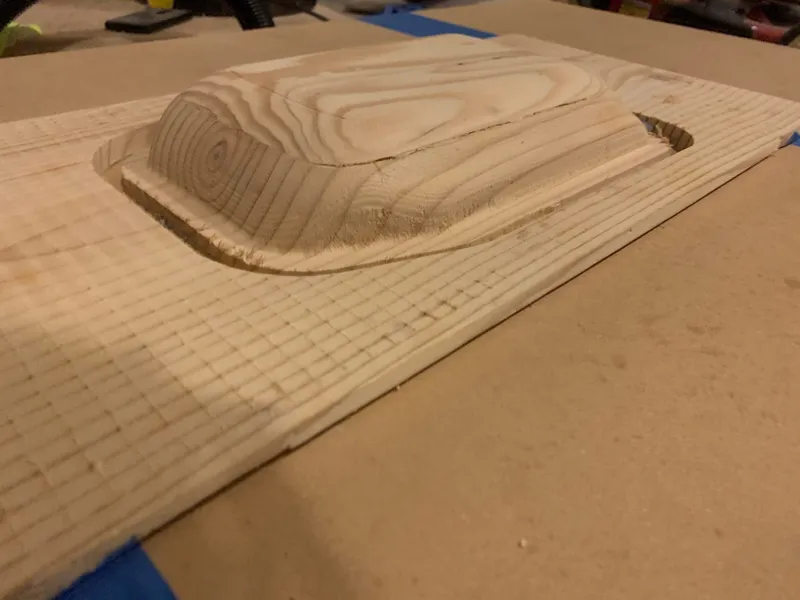 A buck machined from wood.