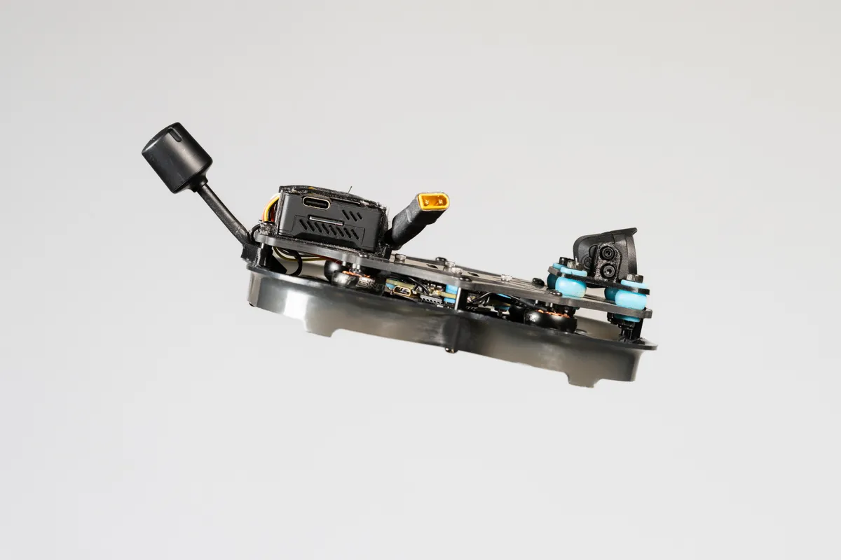 Guarded micro frame with the camera and electronics stack.