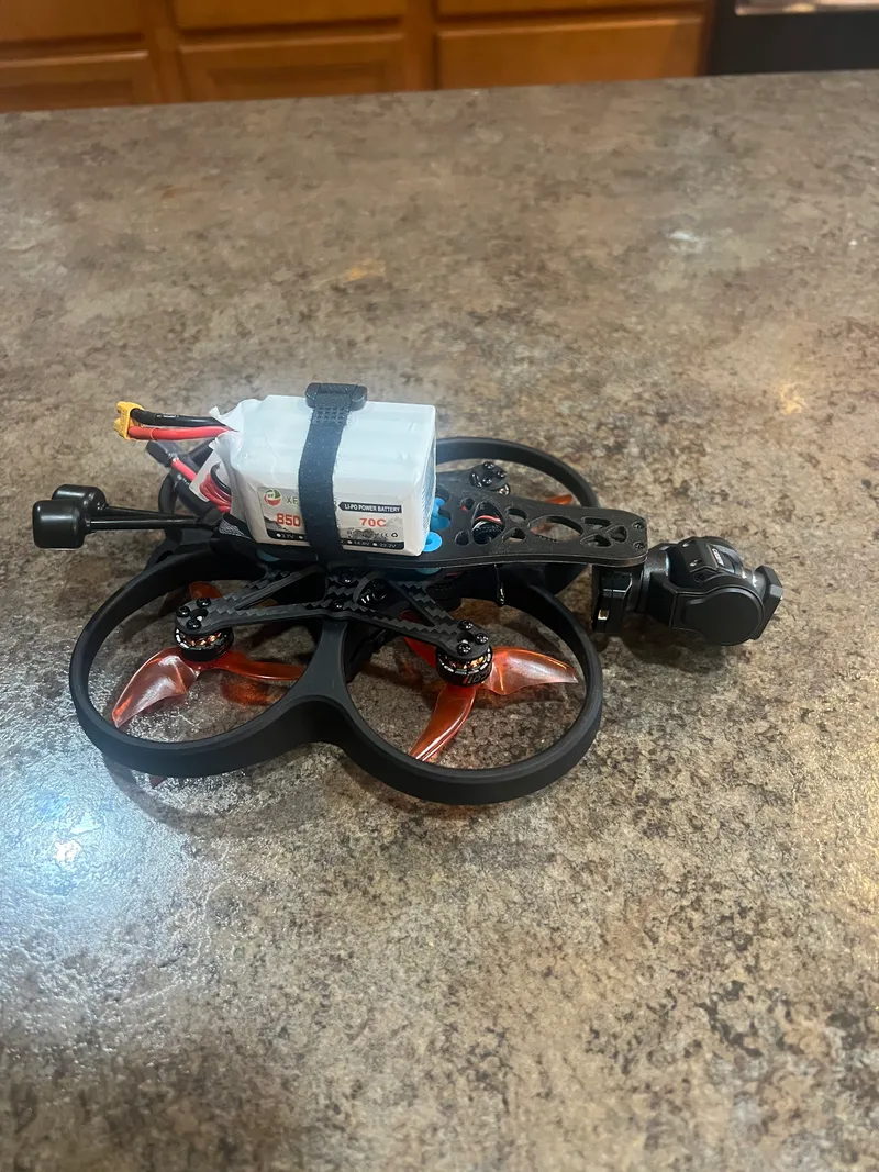 Side view — camera gimbal on the front of the frame.