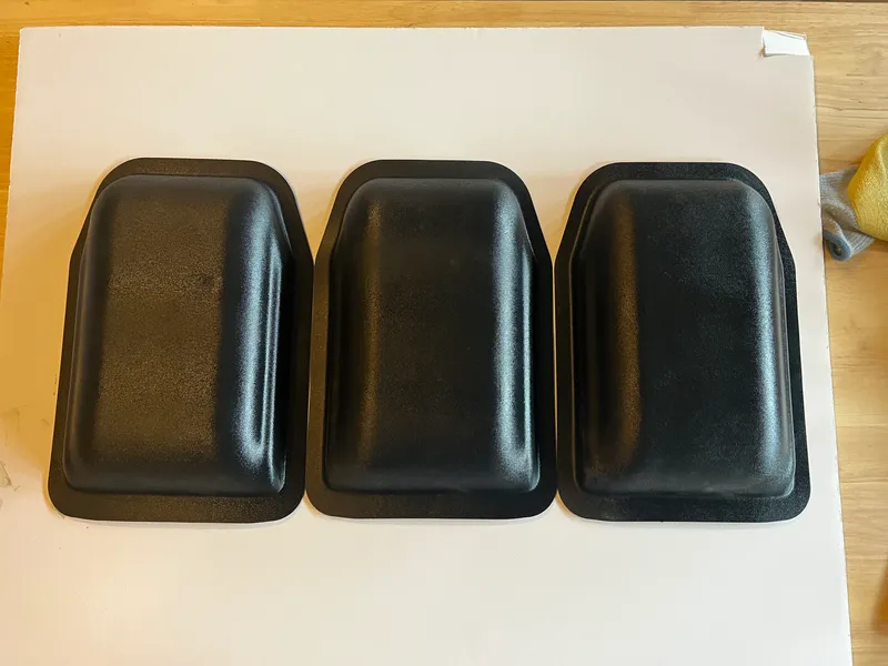 Formed enclosures ready for trimming.